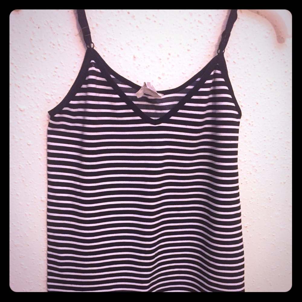 Adjustable spaghetti stripe strap shirt.